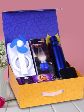 Celebrate Diwali with a 5-in-1 premium gift set featuring a 750ml Bolt SS Bottle, decorative LED blow lamp, USB table fan, folding metal mobile stand, and sugar-free D’Lite cookies—elegantly packed in a magnetic gift box with handle.