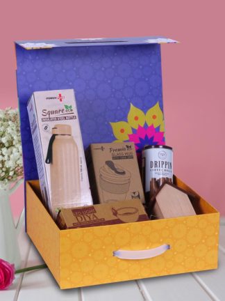 Diwali Gift Square Eco Insulated Bottle, Wooden LED Clock, Glass Mug with Cork Sleeve, LED Light Diya Set of 6, Coffee Roll Sticks in Magnetic Gift Box with Handle